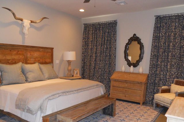 Casita master bedroom with rustic wood furnishings