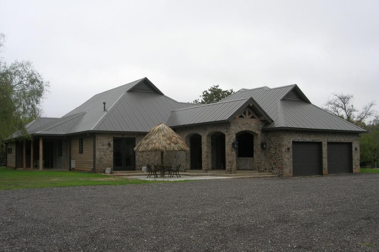 Custom stone home at Ranches of Clear Creek near Hempstead, Texas