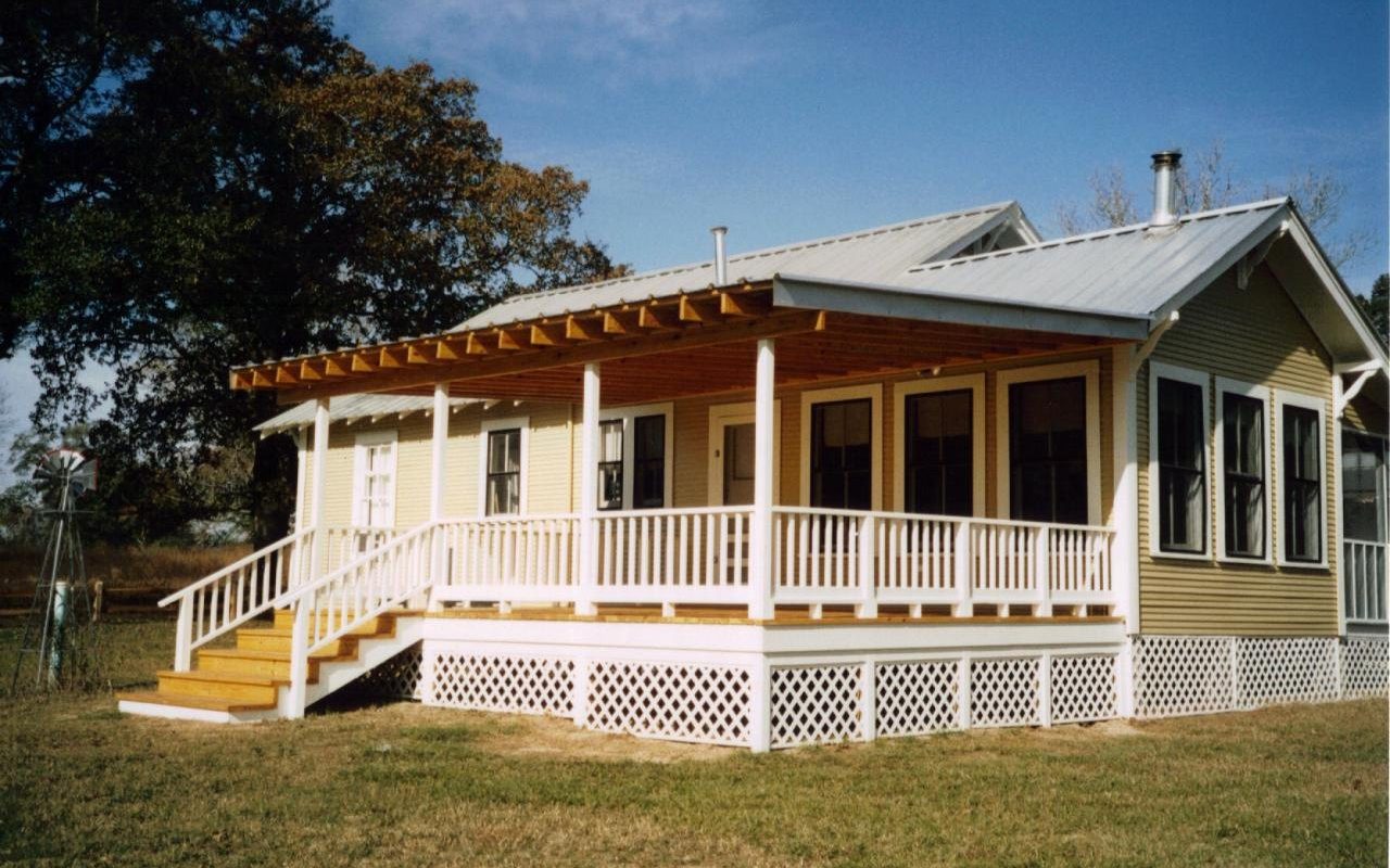 Porch addition on a country home by Cross Creek